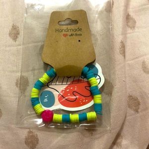 This is the pink kiwi bracelet. Please help support our small business.💗💚💙